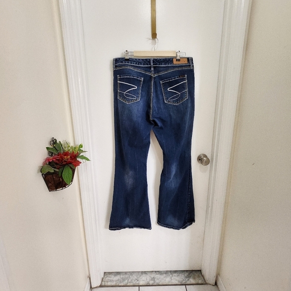 Seven7 high rise flare manufactured color distressed/fading plus size … - Picture 10 of 12